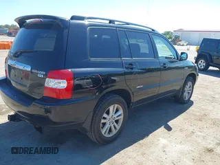 2007 Toyota Highlander Hybrid with VIN JTEHW21A970039728, listed as a IAAI auction lot 42044242 with 200,798 mi miles. Bid and sale history available at carsss.com. Image 4.