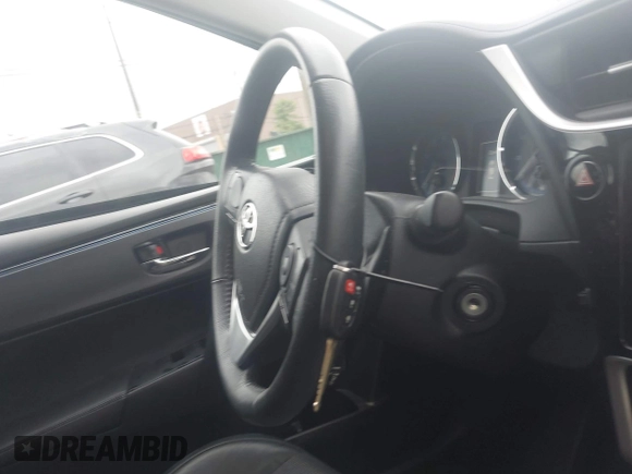 2017 Toyota Corolla L z VIN 5YFBURHE7HP633484, wystawiony jako IAAI lot #42538243 z przebiegiem 80 492 mil mil oraz . Historia ofert i sprzedaży dostępna na DreamBid. Obrazek 11.