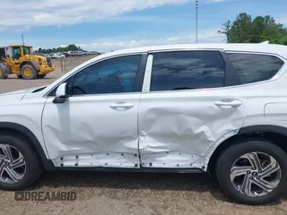 2023 Hyundai Santa Fe SE with VIN 5NMS14AJ9PH630176, listed as a IAAI auction lot 42202536 with 26,624 mi miles and . Bid and sale history available at DreamBid. Image 15.