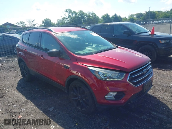 2017 Ford Escape SE z VIN 1FMCU9GD4HUA10240, wystawiony jako IAAI lot #42392522 z przebiegiem 82 325 mil mil oraz . Historia ofert i sprzedaży dostępna na DreamBid. Obrazek 1.