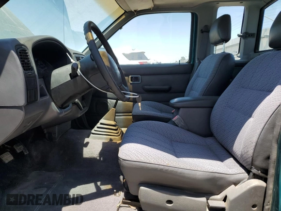 1996 Nissan Frontier XE with VIN 1N6SD16S1TC374614, listed as a Copart auction lot 59817275 with 275,602 mi miles and Clean title. Bid and sale history available at DreamBid. Image 7.
