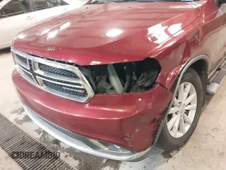 2014 Dodge Durango SXT with VIN 1C4RDHAG2EC344327, listed as a IAAI auction lot 41506093 with 142,264 mi miles and . Bid and sale history available at carsss.com. Image 6.