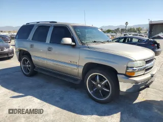 2002 Chevrolet Tahoe LS с VIN 1GNEC13T62R243097, выставлен на аукционе Copart как лот 64210815 с пробегом 254 318 миль миль и Списание • Salvage title. История ставок и продаж доступна на DreamBid. Изображение 4.