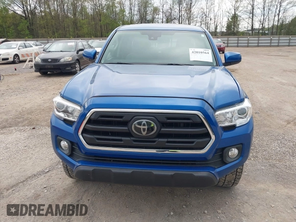 2018 Toyota Tacoma SR5 with VIN 3TMAZ5CNXJM069212, listed as a IAAI auction lot 42010564 with 73,825 mi miles and . Bid and sale history available at DreamBid. Image 12.
