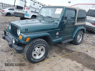 1999 Jeep Wrangler Sahara with VIN 1J4FY49S5XP482037, listed as a IAAI auction lot 42341723 with 161,081 mi miles and . Bid and sale history available at DreamBid. Image 2.