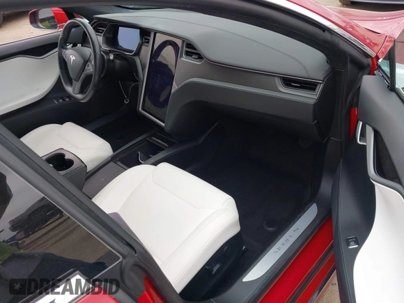 2019 Tesla Model S 100D z VIN 5YJSA1E46KF332066, wystawiony jako IAAI lot #42189828 z przebiegiem 55 751 mil mil oraz . Historia ofert i sprzedaży dostępna na DreamBid. Obrazek 5.