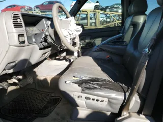 1999 GMC Denali z VIN 1GKEK13R4XR909773, wystawiony jako Copart lot #80350594 z przebiegiem 177 807 mil mil oraz Szkody całkowita. Historia ofert i sprzedaży dostępna na DreamBid. Obrazek 7.