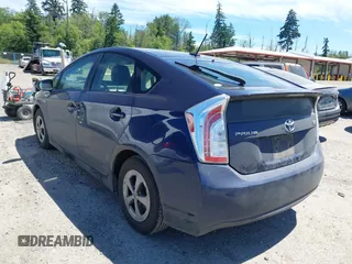 2014 Toyota Prius Four with VIN JTDKN3DU7E1742714, listed as a IAAI auction lot 42637235 with 184,734 mi miles and . Bid and sale history available at DreamBid. Image 3.