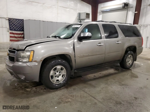 2009 Chevrolet Suburban LT w/1LT with VIN 1GNFK26399R247244, listed as a Copart auction lot 86077374 with 173,513 mi miles and Salvage Title. Bid and sale history available at carsss.com. Image 1.