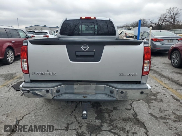 2014 Nissan Frontier SL z VIN 1N6AD0FV2EN720242, wystawiony jako Copart lot #86976214 z przebiegiem 118 581 mil mil oraz Szkoda całkowita • Salvage title. Historia ofert i sprzedaży dostępna na DreamBid. Obrazek 6.