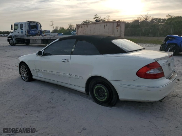 2009 Mercedes-Benz CLK-Class 3.5L with VIN WDBTK56F39T101902, listed as a Copart auction lot 42807775 with 97,404 mi miles and Salvage Title. Bid and sale history available at carsss.com. Image 2.