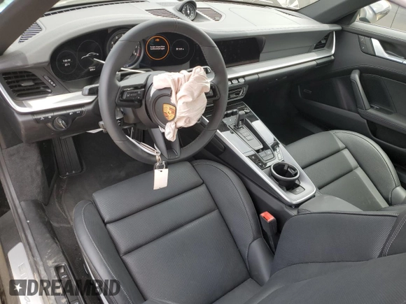 2024 Porsche 911 Carrera S with VIN WP0AB2A92RS218949, listed as a Copart auction lot 57306844 with 1,296 mi miles and Salvage Title. Bid and sale history available at carsss.com. Image 8.