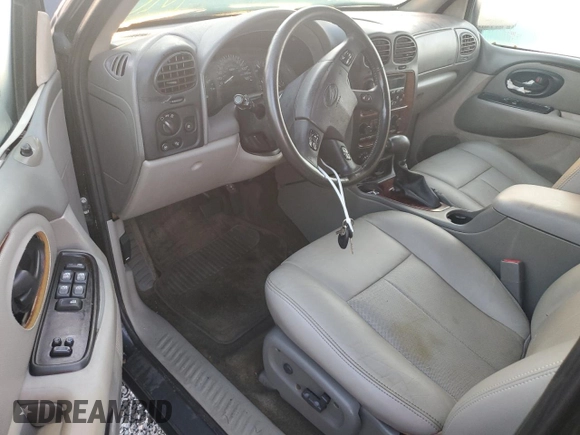2002 Oldsmobile Bravada z VIN 1GHDT13S722120746, wystawiony jako Copart lot #77028294 z przebiegiem Nie podano mil oraz Nie do naprawy • Non repairable. Historia ofert i sprzedaży dostępna na DreamBid. Obrazek 8.