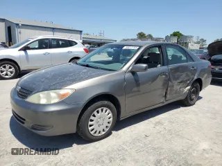 2002 Toyota Camry LE z VIN 4T1BE32K12U610684, wystawiony jako Copart lot #56012755 z przebiegiem 254 878 mil mil oraz Szkoda całkowita • Salvage title. Historia ofert i sprzedaży dostępna na DreamBid. Obrazek 1.