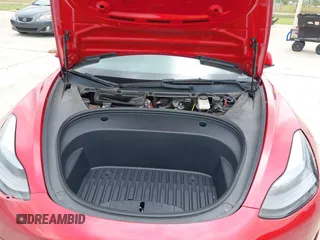 2023 Tesla Model 3 with VIN 5YJ3E1EA0PF455058, listed as a IAAI auction lot 42201618 with 31,147 mi miles and . Bid and sale history available at DreamBid. Image 10.
