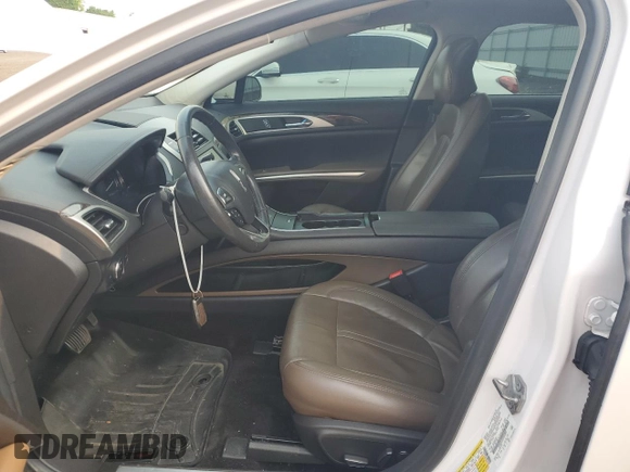 2014 Lincoln MKZ Hybrid z VIN 3LN6L2LU5ER823084, wystawiony jako Copart lot #59597565 z przebiegiem 126 402 mil mil oraz Szkoda całkowita • Salvage title. Historia ofert i sprzedaży dostępna na DreamBid. Obrazek 7.