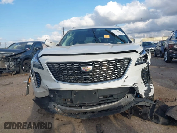 2021 Cadillac XT4 FWD Premium Luxury with VIN 1GYFZCR47MF084998, listed as a IAAI auction lot 41483283 with 1 mi miles. Bid and sale history available at carsss.com. Image 6.