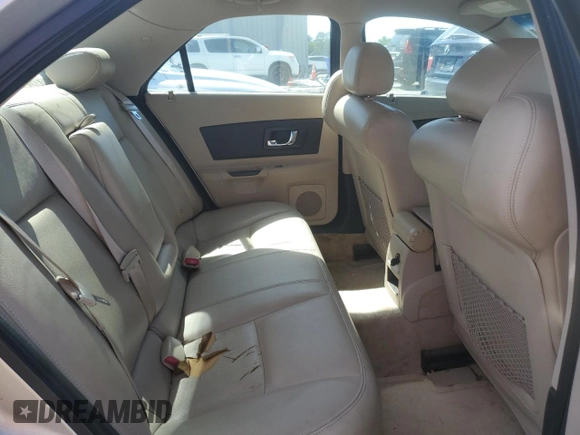 2004 Cadillac CTS with VIN 1G6DM577140143103, listed as a Copart auction lot 52082795 with 137,393 mi miles and Salvage title. Bid and sale history available at DreamBid. Image 10.