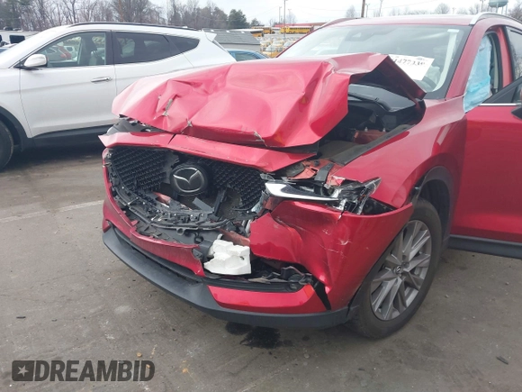 2020 Mazda CX-5 Grand Touring with VIN JM3KFADMXL0842026, listed as a IAAI auction lot 41477339 with 60,755 mi miles. Bid and sale history available at carsss.com. Image 6.