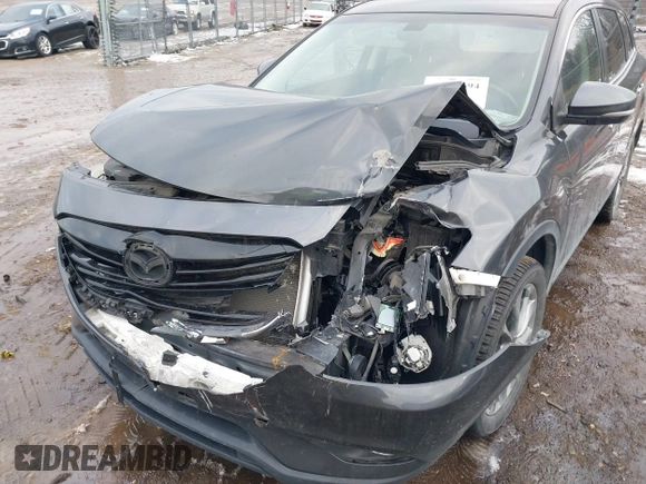2015 Mazda CX-9 Grand Touring with VIN JM3TB2DAXF0447537, listed as a IAAI auction lot 41191694 with 157,113 mi miles. Bid and sale history available at carsss.com. Image 6.