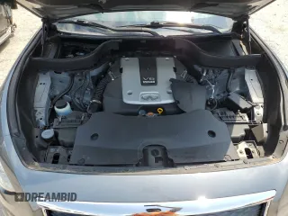 2017 Infiniti QX70 z VIN JN8CS1MU8HM142437, wystawiony jako Copart lot #66139144 z przebiegiem 104 241 mil mil oraz Szkoda całkowita • Salvage title. Historia ofert i sprzedaży dostępna na DreamBid. Obrazek 12.