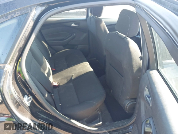 2018 Ford Focus SE with VIN 1FADP3FEXJL286396, listed as a IAAI auction lot 42634912 with 73,769 mi miles and . Bid and sale history available at DreamBid. Image 8.