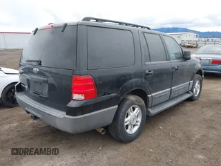 2005 Ford Expedition Special Service with VIN 1FMPU16515LA34140, listed as a IAAI auction lot 41836095 with 214,365 mi miles. Bid and sale history available at carsss.com. Image 4.