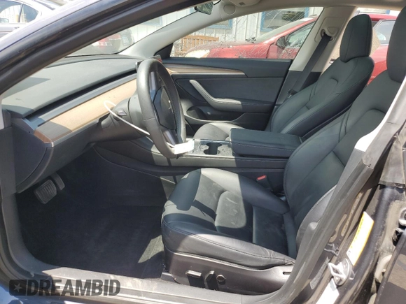 2023 Tesla Model 3 with VIN 5YJ3E1EA4PF614129, listed as a Copart auction lot 62019385 with 23,218 mi miles and Salvage title. Bid and sale history available at DreamBid. Image 7.