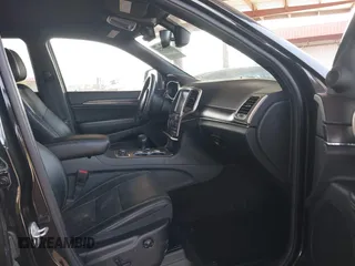 2014 Jeep Grand Cherokee Limited z VIN 1C4RJFBM9EC409093, wystawiony jako IAAI lot #42255242 z przebiegiem 121 059 mil mil oraz . Historia ofert i sprzedaży dostępna na DreamBid. Obrazek 5.