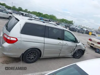 2007 Honda Odyssey Touring z VIN 5FNRL38877B091046, wystawiony jako IAAI lot #42187965 z przebiegiem Nie podano mil oraz . Historia ofert i sprzedaży dostępna na DreamBid. Obrazek 13.