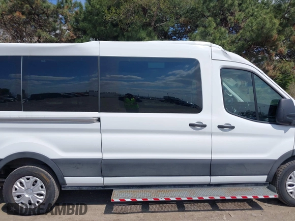 2021 Ford Transit Cargo with VIN 1FTBR1C85MKA66513, listed as a IAAI auction lot 42016528 with 18,174 mi miles and . Bid and sale history available at DreamBid. Image 13.