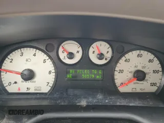 2005 Mercury Sable LS z VIN 1MEFM55S25A614425, wystawiony jako Copart lot #46335805 z przebiegiem 58 579 mil mil oraz Szkoda całkowita • Salvage title. Historia ofert i sprzedaży dostępna na DreamBid. Obrazek 9.