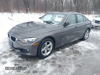 2015 BMW 3 Series 328i xDrive with VIN WBA3B5G55FNS12357, listed as a IAAI auction lot 41564058 with 91,573 mi miles. Bid and sale history available at carsss.com. Image 2.