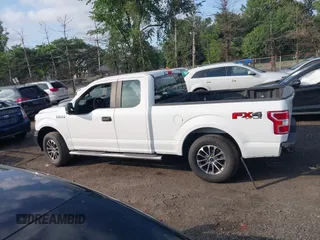 2018 Ford F-150 XL with VIN 1FTEX1EB0JFB32577, listed as a IAAI auction lot 42704857 with 147,359 mi miles and . Bid and sale history available at DreamBid. Image 14.