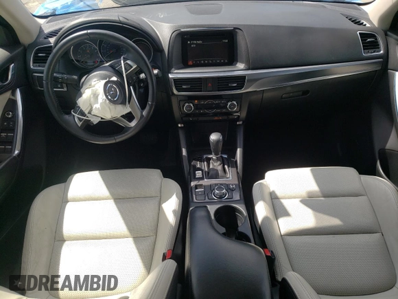 2016 Mazda CX-5 Grand Touring with VIN JM3KE4DY6G0857197, listed as a Copart auction lot 44500955 with 76,088 mi miles and Salvage Title. Bid and sale history available at DreamBid. Image 8.