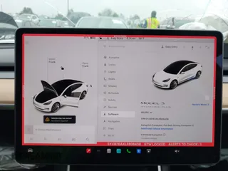 2020 Tesla Model 3 Standard Range Plus z VIN 5YJ3E1EAXLF806438, wystawiony jako IAAI lot #42104964 z przebiegiem 89 065 mil mil oraz . Historia ofert i sprzedaży dostępna na DreamBid. Obrazek 7.