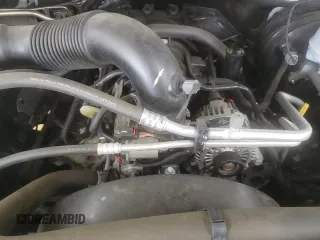 2021 Ram 1500 Tradesman z VIN 1C6RR7FT5MS505380, wystawiony jako Copart lot #65763575 z przebiegiem 106 445 mil mil oraz Szkoda całkowita • Salvage title. Historia ofert i sprzedaży dostępna na DreamBid. Obrazek 13.