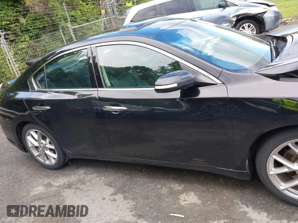 2010 Nissan Maxima SV z VIN 1N4AA5AP1AC823701, wystawiony jako IAAI lot #42257488 z przebiegiem 216 934 mil mil oraz . Historia ofert i sprzedaży dostępna na DreamBid. Obrazek 13.