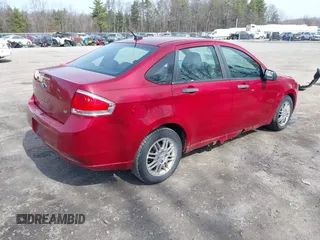 2011 Ford Focus SE with VIN 1FAHP3FN0BW139862, listed as a IAAI auction lot 41906585 with 56,774 mi miles. Bid and sale history available at carsss.com. Image 4.