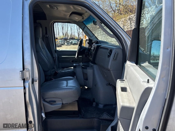 2012 Ford Econoline Cargo Van Recreational with VIN 1FTNE2EW4CDA37064, listed as a Copart auction lot 52738215 with 202,117 mi miles and Clean Title. Bid and sale history available at carsss.com. Image 5.