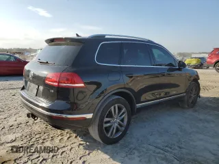 2016 Volkswagen Touareg Sport with VIN WVGEF9BP7GD010767, listed as a Copart auction lot 44782585 with 125,970 mi miles and Salvage Title. Bid and sale history available at DreamBid. Image 3.