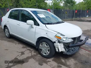 2010 Nissan Versa S with VIN 3N1BC1AP2AL409285, listed as a IAAI auction lot 42182721 with 266,855 mi miles and . Bid and sale history available at DreamBid. Image 1.