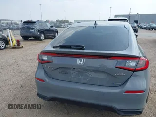 2025 Honda Civic Sport Touring z VIN 19XFL4H94SE000539, wystawiony jako IAAI lot #41777545 z przebiegiem 7 128 mil mil oraz . Historia ofert i sprzedaży dostępna na DreamBid. Obrazek 16.