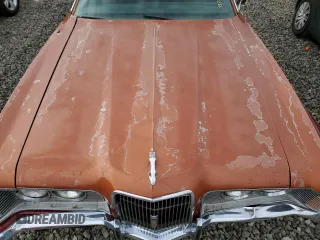 1973 Mercury Cougar z VIN 2F91H514784, wystawiony jako Copart lot #86101104 z przebiegiem 74 018 mil mil oraz Szkody całkowita. Historia ofert i sprzedaży dostępna na DreamBid. Obrazek 11.