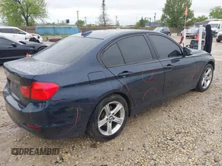 2013 BMW 3 Series 328i xDrive with VIN WBA3B3C50DJ698249, listed as a IAAI auction lot 42303923 with 130,527 mi miles and . Bid and sale history available at DreamBid. Image 4.
