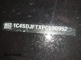 2023 Dodge Durango Pursuit z VIN 1C4SDJFTXPC690952, wystawiony jako IAAI lot #41663311 z przebiegiem 12 806 mil mil oraz . Historia ofert i sprzedaży dostępna na DreamBid. Obrazek 9.
