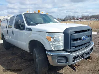 2015 Ford Super Duty F-250 SRW Lariat with VIN 1FT7W2B62FED04453, listed as a IAAI auction lot 41879422 with 313,725 mi miles. Bid and sale history available at carsss.com. Image 1.