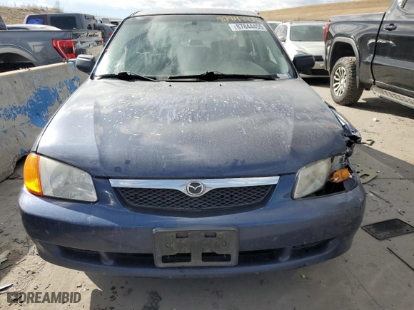 2000 Mazda Protege ES with VIN JM1BJ2210Y0296401, listed as a Copart auction lot 87844455 with 163,970 mi miles and Salvage Title. Bid and sale history available at carsss.com. Image 5.