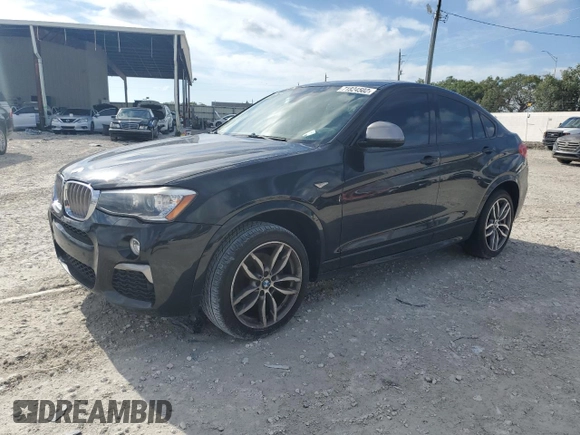 2017 BMW X4 M40i with VIN 5UXXW7C55H0U24877, listed as a Copart auction lot 71824502 with 0 mi miles. Bid and sale history available at carsss.com. Image 1.