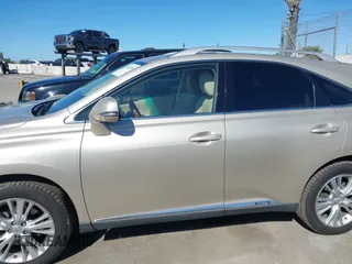 2011 Lexus RX 450h with VIN JTJBC1BAXB2420753, listed as a IAAI auction lot 41823358 with 102,714 mi miles and . Bid and sale history available at DreamBid. Image 14.